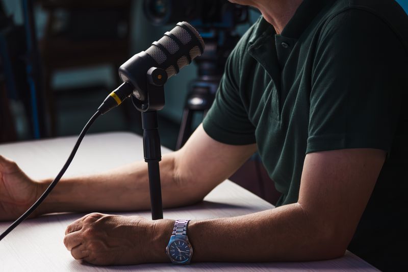 Podcaster at the mic